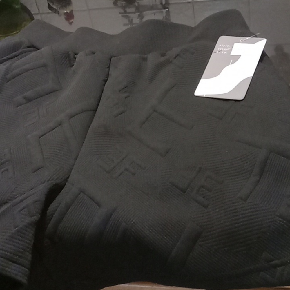 Woman's black shorts very stretching material. Size large. Leg insean 3 1/2